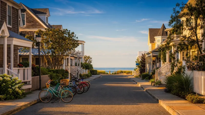 Shore-town main street with cedar-shingled shops and bicycles near the beach, Ocean County NJ Business License