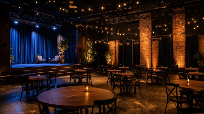Event hall with string lights, round tables and a small stage, How to Start a Bounce House Rental Business in New Jersey